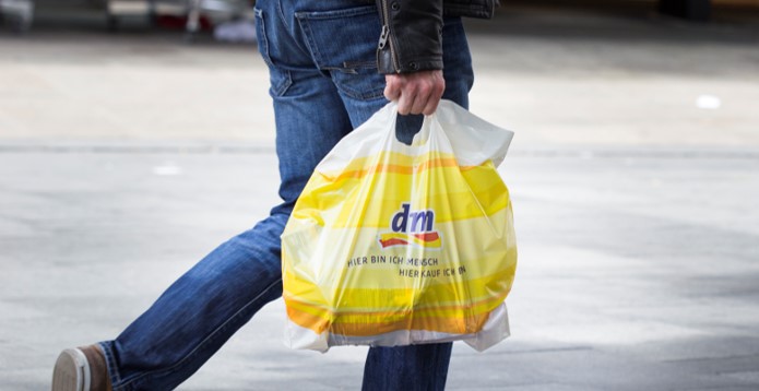 Dm-drogeriemarkt plastic bag shopping street sale stock photo card