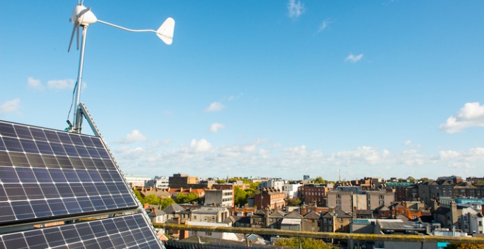 solar-panel-on-roof-with-dublin-city-in-the-background card