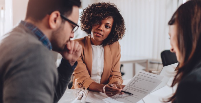 couple-preparing-to-sign-a-contract-of-sale card