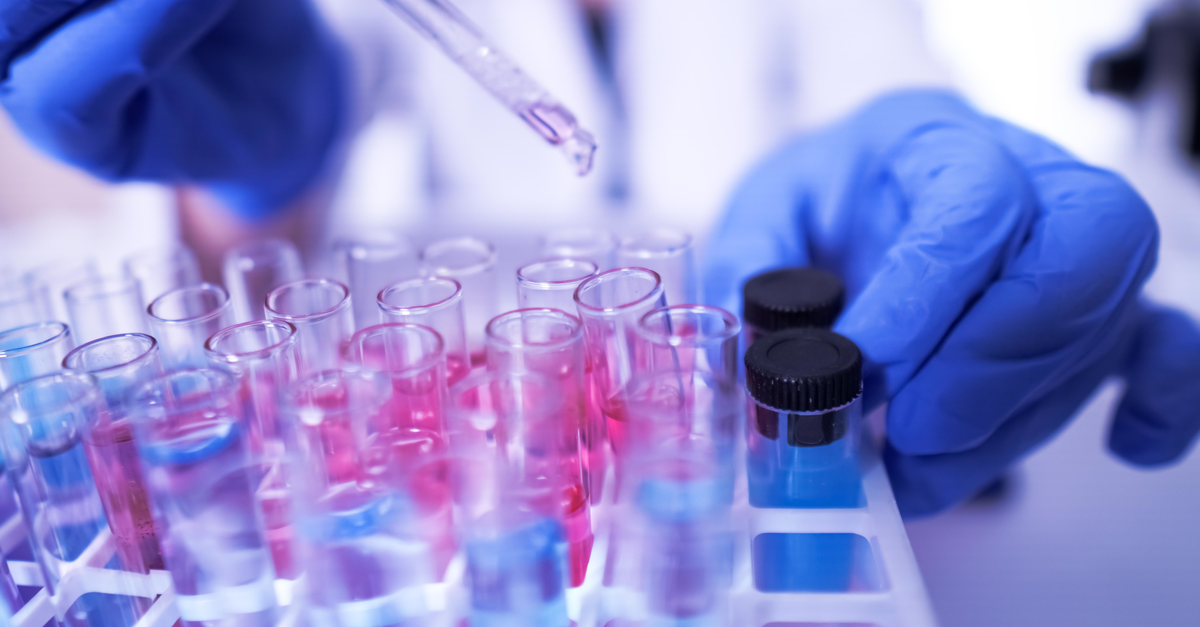 Lab technician working with test tubes